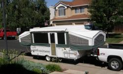 2003 Flagstaff Classic Tent Trailor Wide Body. Two pop-out beds and pop out table. Toilet and shower. Refrigerator. Slide out range. Outdoor shower. Excellent condition