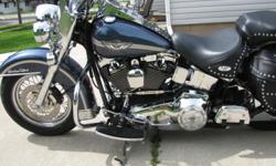 2003 Harley Davidson Heritage Soft Tail Anniversary Edition. Excellent condition. Only 6000 miles. Lots of chrome.