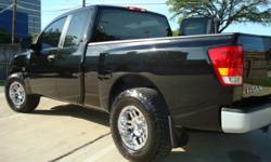 I have a very clean inside and out 2004 Black Nissan Titan EX King Cab V8 5.6L 4x2 68K. NO Salvage Title. TAGS and Inspection are up-to date in March. Great body and engine runs great no problems low miles. 17" Moto Metal wheels Brand new over-sized All