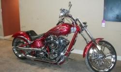 2004 Custom Built Chopper Motorcycle, 100 CI Rev Tech Engine with Decompression Heads, Carbureted, Rolling Thunder Softail Chassis, Custom Paint - Metallic Red with Tribal Graphics, 6-Speed Transmission, Vance & Hines Short Shot Pipes, 12-Spoke Chrome