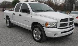 2004 Dodge Ram 1500 Laramie Quad Cab. Automatic transmission and power windows make this a smooth driving great truck! Call us today for our low interest rates -- Visit Auto Care online at www.autocaresales.com to see more pictures of this vehicle or call