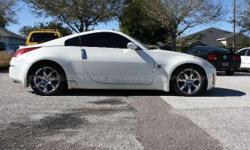 2004 Nissan 350Z&nbsp;Touring&nbsp;2-DR, 3.5L V6 DOHC 24V.&nbsp;Automatic Transmission with option to Manually Shift.
Exterior: White in color. No cracked glass.
Interior: Black front leather seats. A/C, Alpine radio. Power everything. 4-Wheel ABS, RWD,