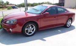 This 2004 Pontiac Grand Prix really is GRAND....Aside from its exterior beauty this vehicle is equipped with leather seats, sunroof, cold ac, and cd player. Take it for a spin TODAY....or call The Corner Lot at 979-703-1888