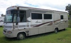 2004 Winnebago Adventurer Class A Motor Home....8,000 original miles, 33', Chevy Workhorse Engine, sleeps 6, 2 slide outs, basement storage, back up camera, skylights, generator, leveling jacks, dual air conditioning, blue ox tow package, like new