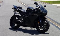 2005 Yamaha R1 Raven Edition with 16,800 miles, dual Two Brothers Racing carbon fiber exhaust, flush mount turn signals, eliminator kit, aftermarket sprocket and chain, frame sliders, bar ends, calibrated speedo healer chip, alarm system that I've never