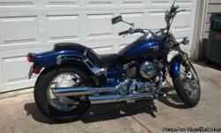 2005 Yamaha V-Star Custom
ALMOST NEW!! LOW MILES!! ONE OWNER!!
Are you interested in a beautiful bike for a fair price?? Well, you have found it!
The basics:
- 650cc
- Blue with ghost flames
- LOW Miles- only 1135 miles!&nbsp;
- Original owner
- Custom