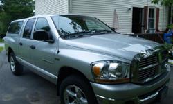 2006 Ram 1500&nbsp; SLT Quad Cab 4x4, 85,000 miles, 5.7 HEMI engine, Thunder Road Value pkg includes 20" aluminum wheels, rear sliding window, power driver's seat, power windows, towing package, Bright metallic silver with matching Leer cap and bedliner,