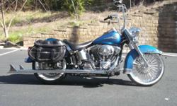 FLSTCI Heritage Softail Classic features:
Rigid-mount, 1450cc Twin Cam 88B balanced engine
Black powder-coated engine with chrome covers
Hardtail styling with hidden, horizontal rear shocks
New clear-lens reflector-optics auxiliary lamps
Studded leather