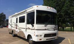 2006 Winnebago Sightseer "29R" Special Edition with 26,500 miles. Ford Triton V10 with the Automatic Transmission, plenty of power and a proven set up. It features two slide outs, one in the living room/kitchen and one in the bedroom. It has a queen size
