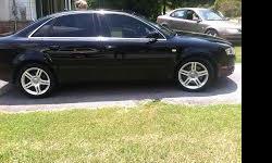 color is black with black leather pwr windows and seat sun roof alloy wheels,70000 miles good gas mileage.