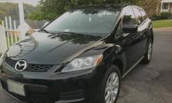 Offering a 2007 mazda cx-7 suv all wheel drive, automatic with manual sport drive option. Bought new, MUST SELL... has 30K miles on it so it has remaining factory warranty. Cruise control and radio controls are also on the steering wheel, must see to