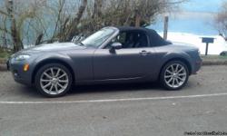 One owner MX5 touring model, cloth soft top, low mileage 75k, Gray w/Black leather interior, all power, AC, New high speed Michelin 205/45ZR17 tires. Large trunk A must have Roadster for cruising this summer!!