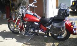 for sale is a 2007 yamaha vstar 650 classic.red with black flames. windshield, skeleton arm & hand mirrors, saddle bags, travel bag, sissy bar, red lights for engine. crash bar, visers, skull turn signal lenses on front. see pics catlettsburg ky /ashland