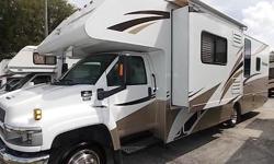 2008 Dutchmen Kodiak, Class C Motor Coach, with 2 Slides, Duramax DIESEL, Dash A/C, 13.5 BTU Rear Roof A/C Unit, Hydraulic Jacks, Back-up Camera, AM/FM.CD Player, Living Room TV, and much, much more, come and See this at America Choice RV, 3040 NW