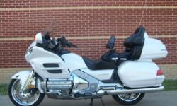 Selling my 2008 Honda GL 1800 Goldwing, this bike is in excellent condition, garage kept and covered.
Has lustrous white paint.
Comfort package with heated grips, seat and directional vents for heat.
Premium Audio System, with IPOD/MP3 hook-up that is