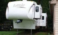 2008 Laredo 300RLS Fifth Wheel
Fifth wheel is in great shape and it's never been smoked in. We purchased this unit new and have all the original paperwork. There is some minor damage due to a blowout (see picture) - estimated cost to repair $500-600.