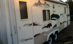 Camping comfort for the outdoors. this gorgeous nearly new 25 foot Kodiak camp trailer will enrich your camping experience. &nbsp; 2 slides, will &nbsp;sleep &nbsp;6-8, 4 burner cook top, microwave, retractable awning, surround sound, gas bbq,