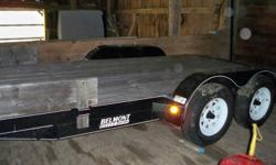 brand new - used just once 8000lb gvw, electric brakes, spare tire and rim,hide away ramps