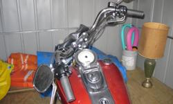 Color: red hot sunglow; excellent condition only 434 miles; 1584cc; two sets of rear shocks, rush pipes and original pipes still in box; tilt back handle bars.