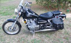 This is a great starter bike good fuel mileage. Has saddlebags and windshield. Has 3500 miles still low. Has a 3 year extended warranty. Has been garaged kept.