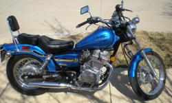 2009 Honda Rebel 250. Mint condition, only 911 miles. Metallic blue. Extras include sissy bar and saddle bag guards. Absolutely gorgeous cruiser. Won't last long.