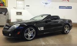 This 2009 Mercedes-Benz SL-Class SL63 AMG just rings of CLASS! CLASS! CLASS! This brilliant car is something you would have to see yourself in and seeing it as already yours. Mercedes is THE car to have! This great car is located in Roslindale, MA.