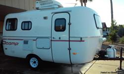 2009 scamp 16ft travel trailer. Lite weight Rear dinning/bed Center. Kitchen. 3 bunner. Stove oven 3 way refrigerator Sink fully self-contained Front. Bunks/sofa everything. Works great extremely clean asking $12,400 Call (520) 878-3421