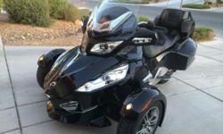 This fantastic Can-Am Spyder RTS was one of the first 1,000 ever built. It is loaded with cruise control, heated hand grips for&nbsp; both riders, an electrically adjustable windshield, semi-automatic 5-speed transmission, reverse gear, am/fm stereo with