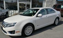 2010 Ford Fusion Hybrid Sedan!! Navigation; Moonroof; Rear View Camera; Blind Spot Monitoring System; Full Power; 17 Alloy Wheels; Heated Seats; Dual Climate Control; Traction Control; Sync; 'Sony' Sound; and Keyless Entry!! All of our inventory is