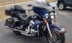 Two toned black/blue , 17,800 miles, regular serviced, clear title, Willie G Skull Accessories, tour pack and saddle bag luggage and lid organizers, Vance & Hines true dual exhaust with monster round mufflers Over $32,000 invested Call 410-925-5865 or
