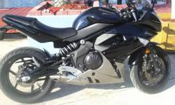 &nbsp;Black 2010 Kawasaki Ninja&nbsp; sport touring bike. Professionallly maintained and only 8,000 miles. Excellent condition.&nbsp;&nbsp;&nbsp;941-545-6986 or 941-545-9527.