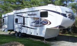 2011 Keystone Montana 3150RL fully loaded fifth wheel, 34 foot, 3 slide-outs, large duct a/c unit, Zero degree 4-seasons insulation package with fully enclosed heated underbelly, full aluminum frame cage construction, gelcoat fiberglass exterior, front