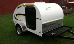 2011 Little Guy 5 Wide......black and yellow graphics for all the Pittsburgh fans. The 5 wide has a queen sized mattress, and it includes the power package which gives you interior and exterior LED lights, 12 volt and 110 outlets, 25 foot power cord to