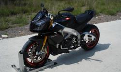 One of a kind 2012 Aprilia Tuono V4. This bike is truly better than new with so many extra`s. Always maintained meticulously and without a single scratch on her. She rides like a dream with fantastic suspension;&nbsp; Seat, rearsets, and handlebars all