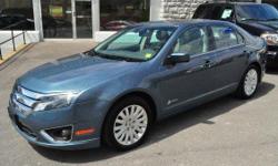 2012 FORD FUSION HYBRID SEDAN!! Rear View Camera; Full Power; 'Sony' Sound; AM/FM/CD; Air Conditioning; Dual Climate Control; Sync; Sirius; All-Weather Floor Mats; 17 Alloy Wheels; Blind Spot Monitoring System; and Keyless Entry!! All of our inventory is