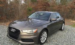 More details at: emmieessivley@thefamilyhome.net . Beautiful A6 that has been kept in immaculate condition - always garaged with low miles (17,574). Exterior is in the very desirable Dakota gray with two-tone leather interior. Fully loaded with every