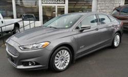 2013 Ford Fusion Energi 'Titanium' Hybrid Sedan!! Navigation; Moonroof; Blind Spot Monitoring System; Rear View Camera; Heated Seats; Remote Starter; Rear Spoiler; 17 Alloy Wheels; Full Power; Push-Button Engine Start/Stop; 'Sony' Sound; Dual Climate