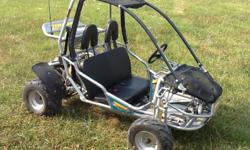 This is the newest in our line of Go-Carts, a Manco Zircon 150cc power machine. Assembled in Indiana. Subaru engine, forward and reverse, disc brakes, electric start, four shock absorber suspension, two-seater with 4-point harness. Variable seat and