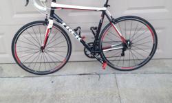 2013 Trek 1.2 Aluminum Frame/Carbon Fork Road Bike. &nbsp;Barely used! Selling with stock components, water bottle cages, seat bag, and nutrition pouch. &nbsp;Will sell with/without aero bars. Great for group rides and even triathlon use. Just not being
