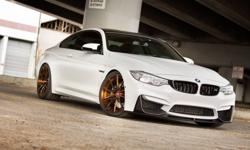 This 2015 BMW M4 is a beautiful Alpine White with 13K miles. It is equipped with every option except Carbon Ceramics. The seller is asking $69K which doesn't include the $20K worth of aftermarket upgrades. This BMW is OEM Alpine and has been fully wrapped