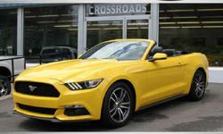 2015 FORD MUSTANG CONVERTIBLE! Glowing Yellow Paint! Premium Eco Boost! SHAKER Sound! Heated AND Cooled Leather Seats! Power Black Convertible Top! Alloy wheels with Like NEW tires! Spotless inside and out! Must be seen and driven! All of our inventory is