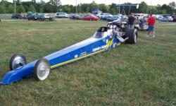 275 Inch Dragster hal canode chassis, 9 in rearend with 468 gear, dual parachute, 548 ci bbc, callies crank, aluminum manley rods, je pistons 11-7 to 1 buttoned, dart heads, melidon gear drive, indy intake, 871 littlefield blower, everything has been port