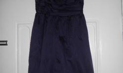 I have available for sale two beautiful dark purple (Lapis) dresses. These dresses were purachsed from David's Bridal and worn once only for a few hours. One dress is a junior size 16 and the other dress is junior size 14. Neither dress has been altered