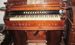 One solid state organ that belonged to my mother. Also have an antique organ that has been converted to electric. It is a beautiful piece that would look great in a house full of antiques. The stops are in German, and it was produced in the late 1800s.