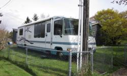 Never smoked in, low mileage (32,000), Class A. 1998 33' Rexhaul-Rexair wide body (model SL3300). Ford 460. Full basement (insulated and illuminated); two roof air units; king size walk around bed + two couches that make into beds AND, turn-around