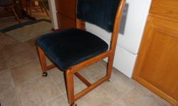 Three Oak chairs on wheels... no arms&nbsp;&nbsp; Upholstery in good shape...No pets or smokers in home
Were used at a snack bar in our home&nbsp; 3 Chairs for $150.00
Could be used at a desk.