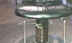 Black used salon chairs in good condition.