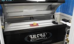 I am selling an Ultra Mega Max Tanning bed with 4 Facials reaason for selling closed salon down and is moving . This is a great unit that comes with top of the line bulbs in it for the tanning indusrty , This unit can be used as a Home / Commercial unit