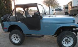 blue 1972 Jeep C-J 5 for sale. 258 straight 6 cylinder almost completely stock except for 2" lift and 30"x9" rims and tires. Almost new B.F Goodrich All-Terrains. New Shocks. Body and paint in good shape. needs re-upholstery. Runs good. 4-speed manual