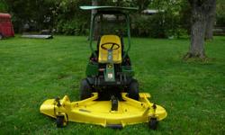 UP FOR AUCTION IS A 1999 - 72" JOHN DEERE FRONT DECK MOWER. MODEL F1145, 28 HORSE DIESEL MOTOR. HOUR METER SETS AT 960 HRS.
THIS IS A 4 WHEEL DRIVE REAR STEER HYDROSTATIC DRIVEN MOWER. PAINT AND BODY IN GOOD CONDITION, THERE ARE SOME MINOR
SCRATCHES AND